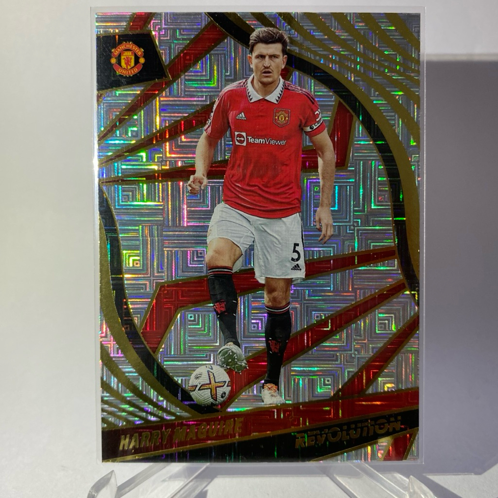 การ์ดนักฟุตบอล  HARRY MAGUIRE, MANCHESTER UNITED, (INFINITE), REVOLUTION, PANINI 2022