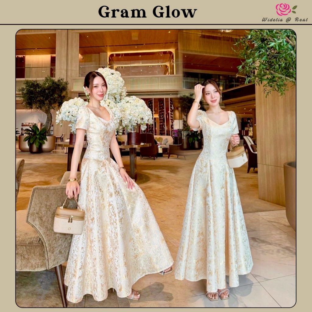 Gram Glow Dress แม็กซี่เดรส แขนสั้น คอเหลี่ยม ซิปหลัง ช่วงกระโปรงทรงบาน เนื้อผ้าทอปั้มลายนูนสีทอง ผ้าอย่างดี มีน้ำหนัก