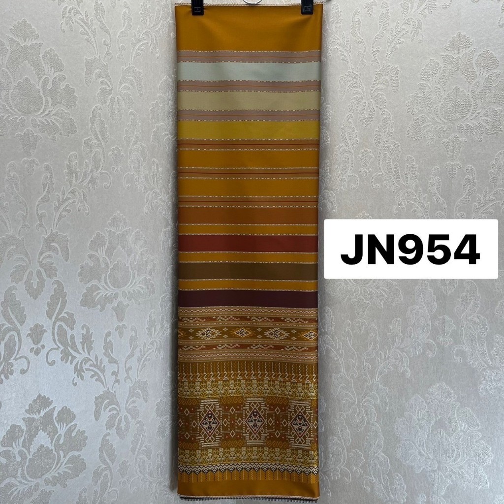 JN954 ผ้าไหมแกมฝ้าย ทอลาย ซิ่นตีนจกสันกำแพง สีน้ำตาลทอง ขนาด 2 หลา