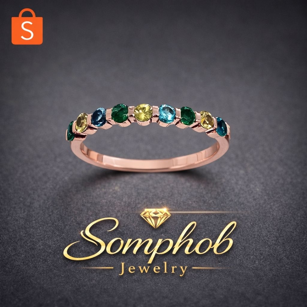 9K gold ring, 2 grams, set with emerald, blue London sapphire, and yellow sapphire