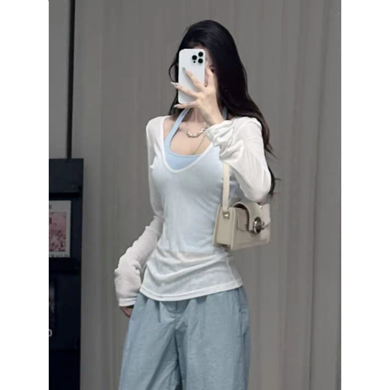 เสื้อกล้ามแขนยาวดีไซน์น่ารักนี้ เหมาะอย่างยิ่งสำหรับการสร้างลุคที่เรียบง่าย มีสไตล์ และสบายๆ ในฤดูกาลนี้
