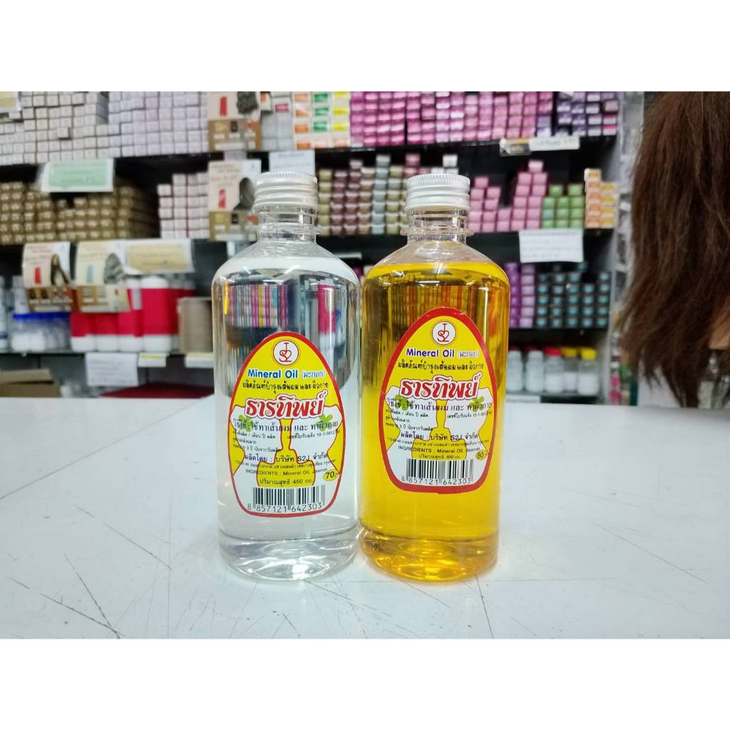 น้ำมันมะกอก ธารทิพย์ ผลิตภัณฑ์บำรุงเส้นผม และ ผิวกาย สีขาว สีเหลือง 450 ซีซี 1 ขวด