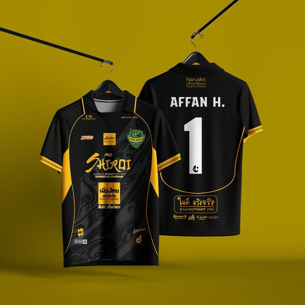 เสื้อเยือนสโมสรฟุตบอลนรา ยูไนเต็ด สีดำตัดเหลือง รอบแชมป์เปี้ยนส์ลีก 2026