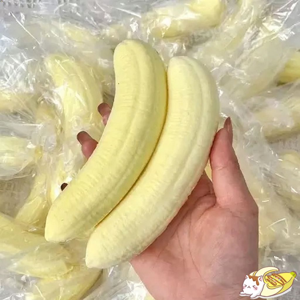 ของเล่นบีบ: ของเล่นรูปกล้วยนุ่มนิ่มฟูฟ่อง คืนตัวช้า