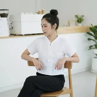 เสื้อผ้าฝ้ายด๊อบบี้ ผูกโบว์ดอกทิวลิป เนื้อนุ่มใส่สบาย ตัวผ้าทอลายนูนมีเอกลักษณ์