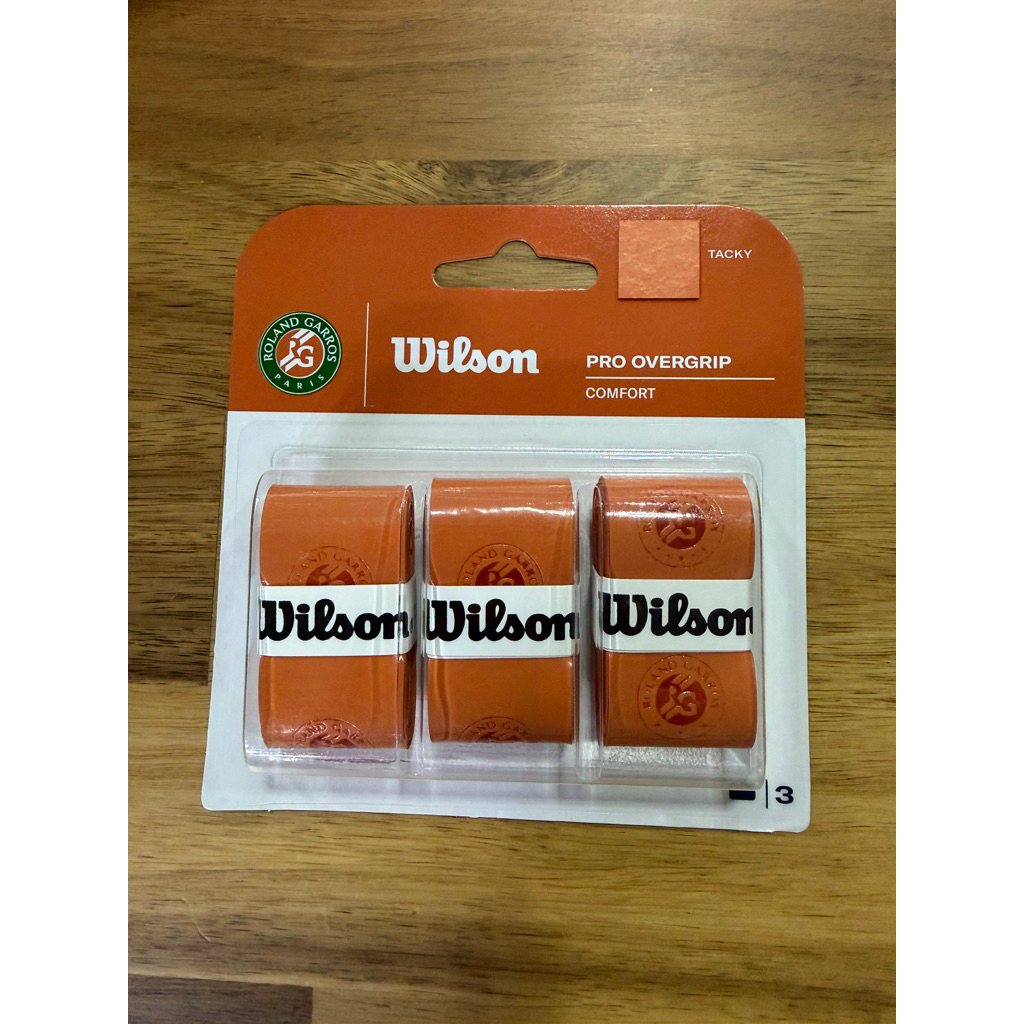 ที่พันด้ามไม้เทนนิส WILSON PRO OVERGRIP COMFORT ROLAND GARROS PACK ( 1 แพ็ค / 3 ชิ้น )
