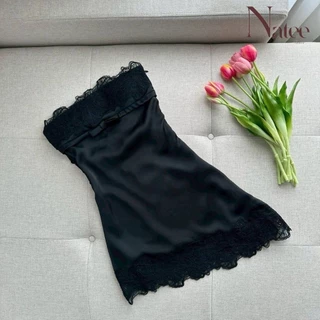 Natee Dress เดรสเกาะอกสีไอวอรี่ ที่ตัดเย็บจากผ้าซาตินเนื้อเงา ตกแต่งด้วยผ้าลูกไม้ฉลุลายดอกไม้