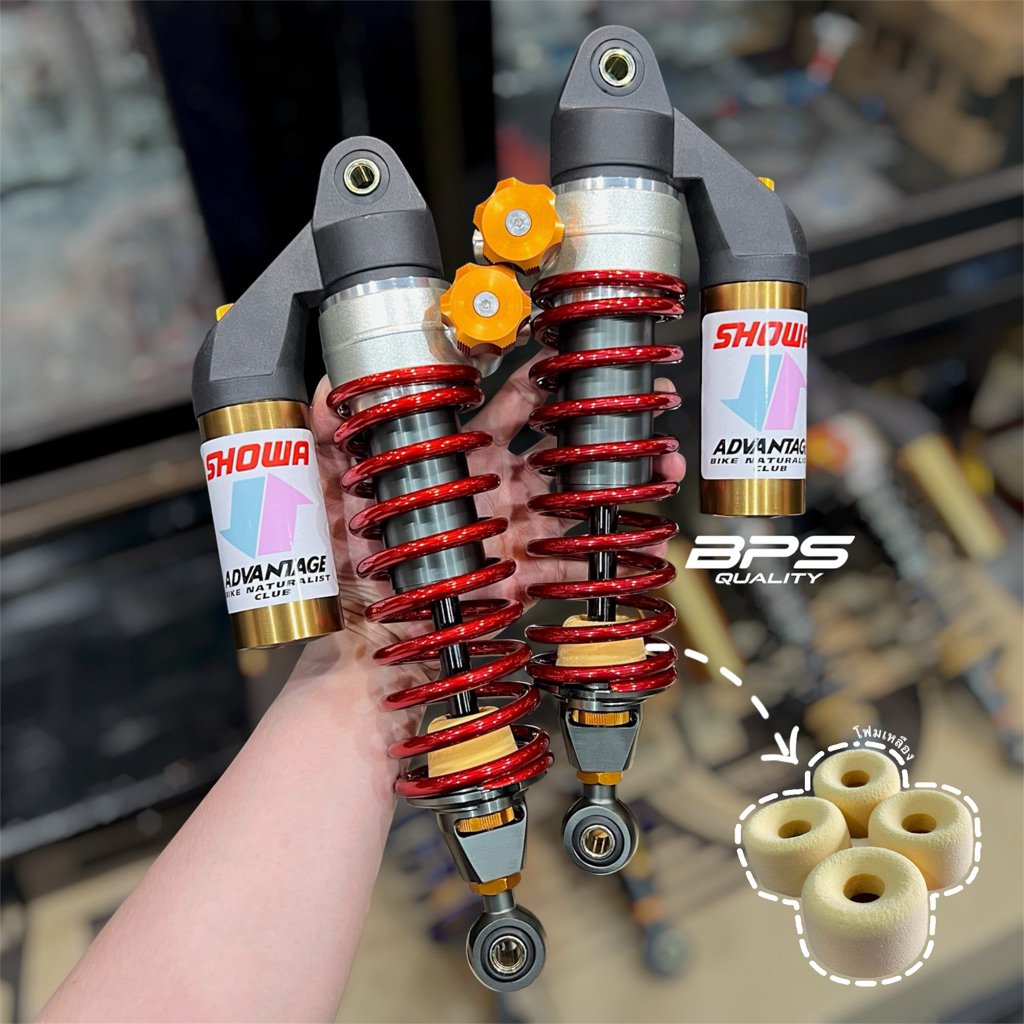 Shock SHOWA trục đen lắp ghép khí nén thật, bộ hệ thống mềm‑đàn hồi (bọt vàng đặc biệt), chiều cao 330 mm, bảo hành rò rỉ 3 tháng.