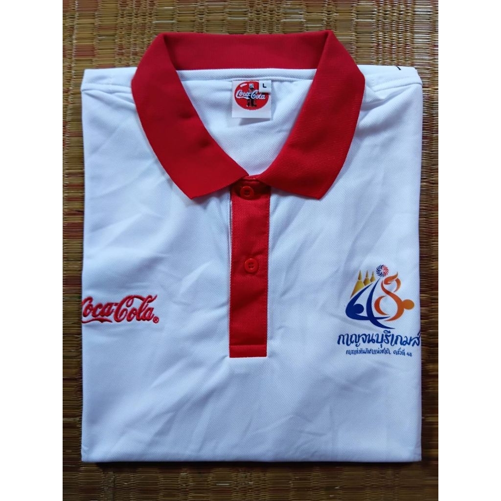 เสื้อเซอร์วิส Coca-Cola