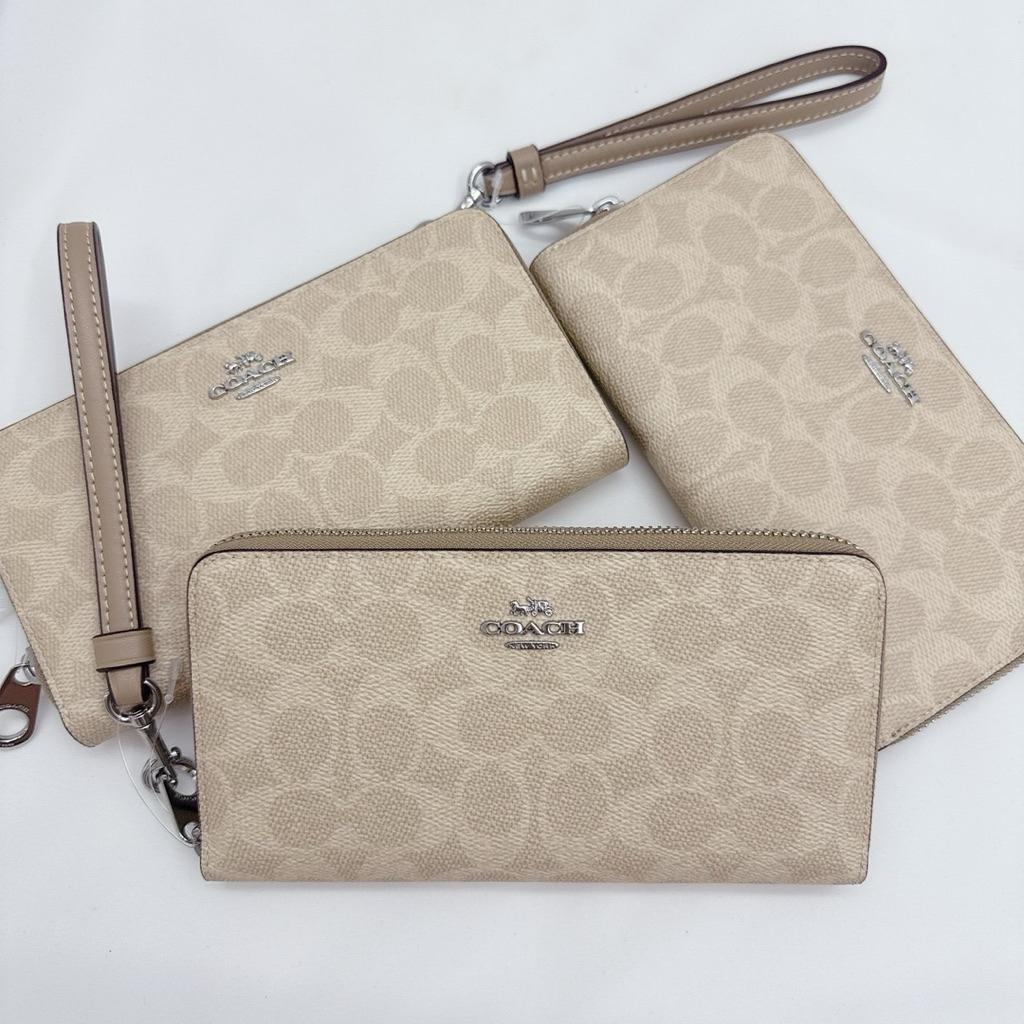 💚แท้💯 พร้อมส่ง💚𝐂𝐨𝐚𝐜𝐡 Long Zip Around Wallet In Signature Canvas With Stripe cw778