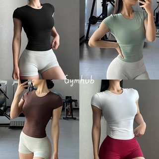 GYMHUB เสื้อแขนสั้นสตรีสำหรับโยคะและออกกำลังกาย ดีไซน์รวบเอวเพรียวสวย ผ้ายืดหยุ่นสวมใส่สบาย