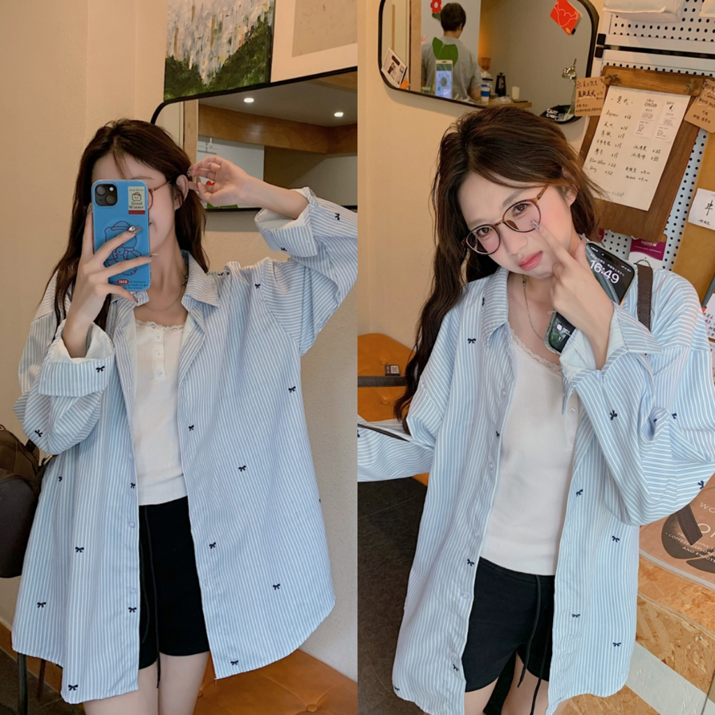 😍เสื้อเชิ้ตแขนยาวสไตล์เกาหลีสำหรับผู้หญิง เสื้อเชิ้ตลายทางพิมพ์ลายโบว์ ทรงหลวม ใช้งานได้หลากหลาย