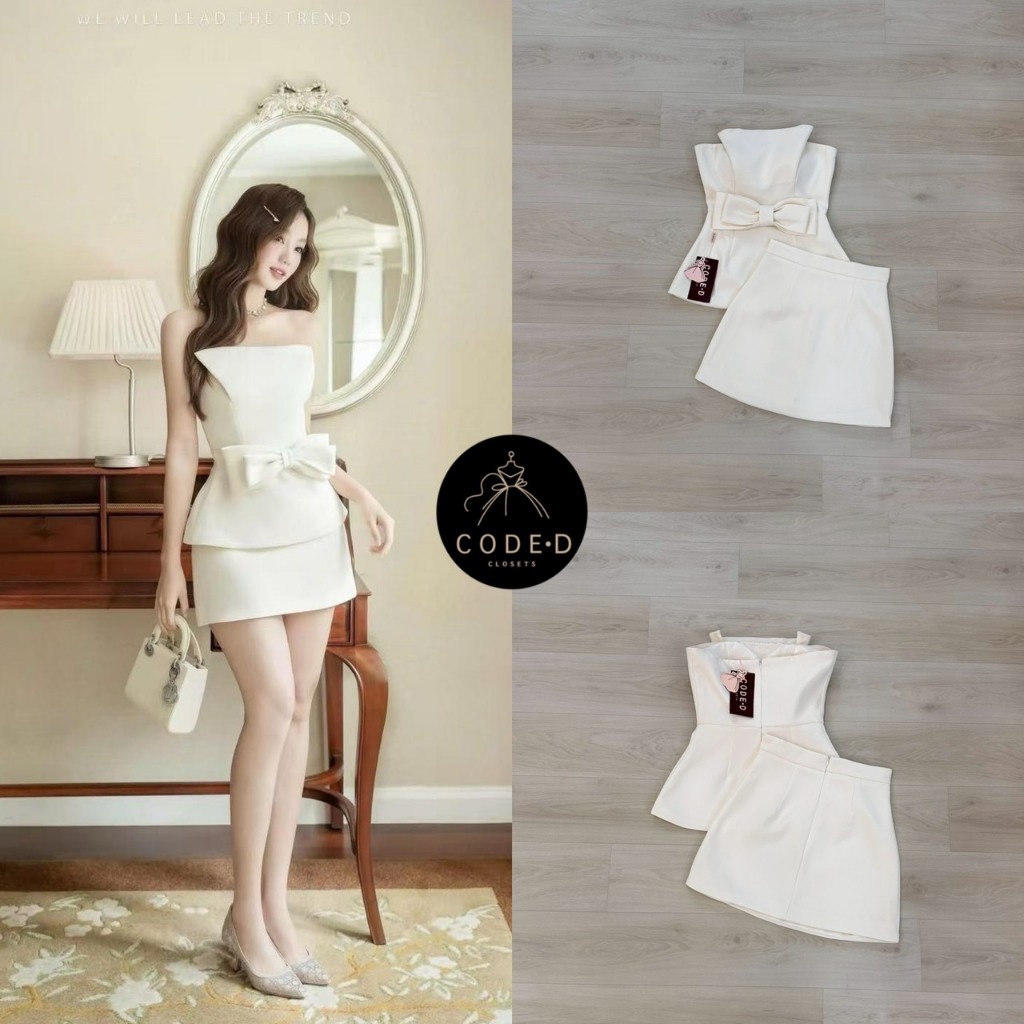 CODE-D | Set 2 ชิ้น สีครีมเสื้อเกาะอกด้านหน้าจับจีบสูงช่วงกลางช่วงเอวเย็บติดโบว์ใหญ่ กับกระโปรงสั้น 