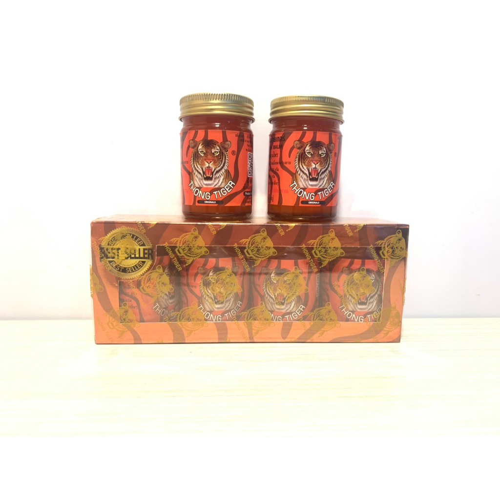 THONG TIGER BALM 50g ยาหม่องทองไทเกอร์ สูตรร้อน 50กรัม ปวด เมื่อย แมลงกัดต่อย