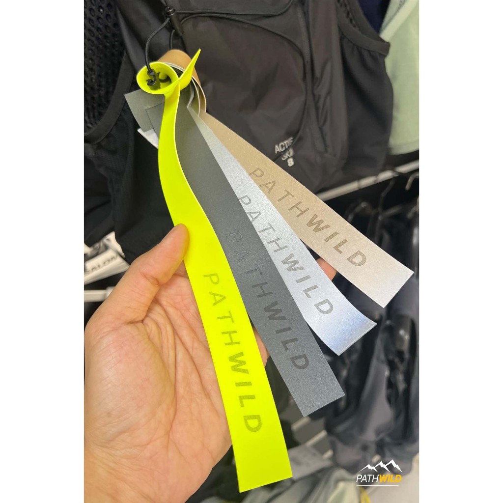 PATHWILD REFLECTIVE RIBBON TAPE ริบบิ้นสะท้อนแสง ขนาด 12 นิ้ว สะท้อนแสงสองด้าน พร้อมช่องใช้คล้องกับเป้ได้