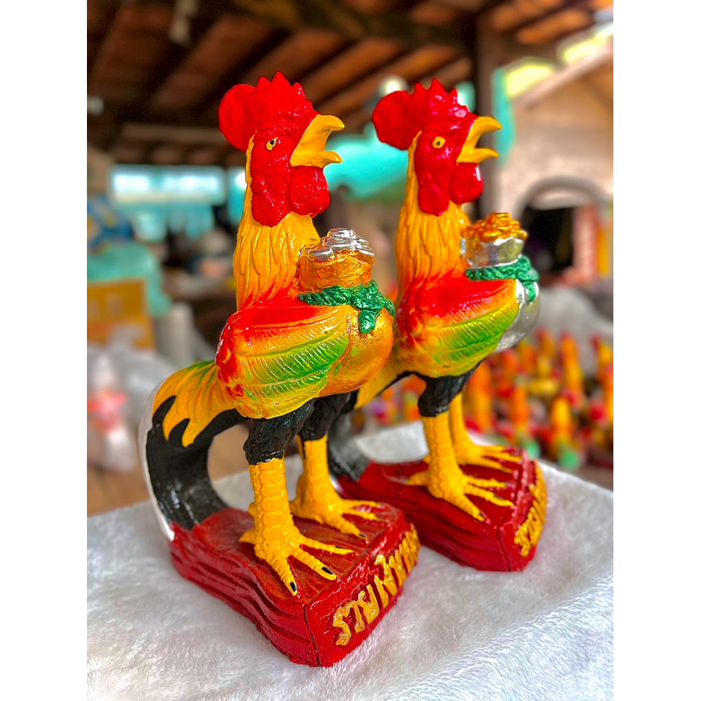 ไก่แก้บนอุ้มถุงเงินถุงทองสูง 26 เซนติเมตรคู่ละ 199 บาท