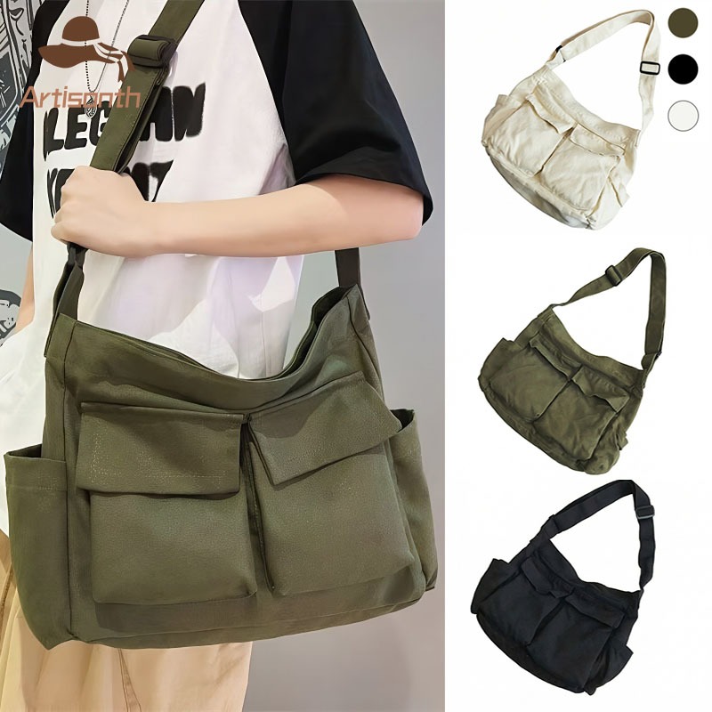 ส่งเร็ว กระเป๋าสะพายผ้าใบขนาดใหญ่ insแฟชั่น Commuter Messenger ความจุขนาดใหญ่สายสะพายไหล่ปรับได้ และนักเรียน.COD
