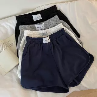 กางเกงขาสั้นลำลองสีพื้นเรียบง่ายสไตล์สปอร์ต เสื้อผ้าผู้หญิงรุ่นใหม่สำหรับฤดูใบไม้ผลิปี 2026 กางเกงขาสั้นอเนกประสงค์