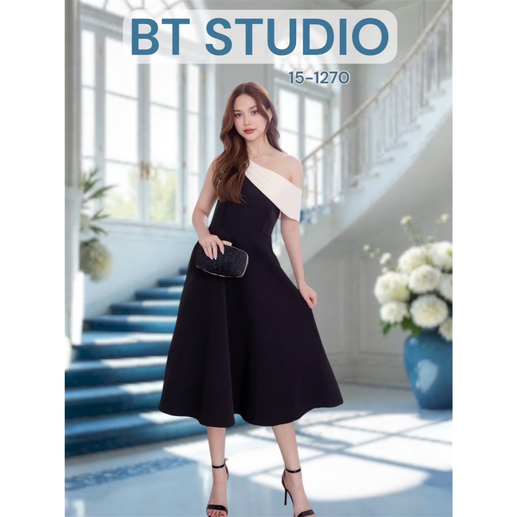 BT 15-1270 เดรสยาวคลุมเข่าไหล่เดียวดีเทลแต่งสายพาดสีครีมแต่งผูกไหล่ข้างเดียว อีกข้างปิดต้นแขน กระโปรงบานออก มีซิปหลัง
