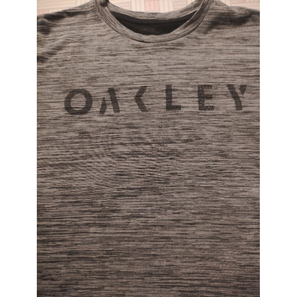 เสื้อยืดทรงsport OAKLEY ผ้ายืด
