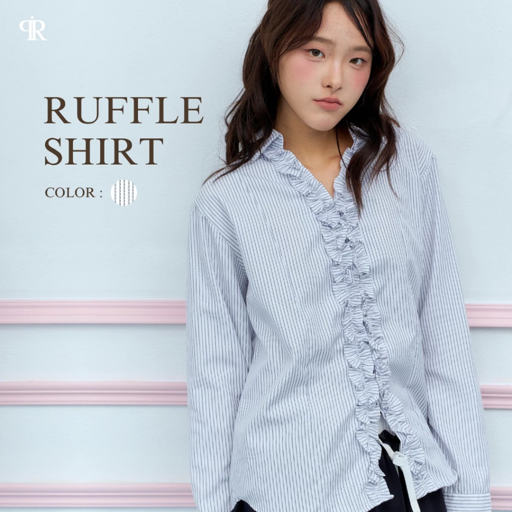 Panchitar Ruffle Shirt – เสื้อเชิ้ตแขนยาวสีขาวลายทางสีฟ้า ที่เพิ่มความไม่ธรรมดาด้วยระบายกลางอกและดีเทลซ่อนกระดุม