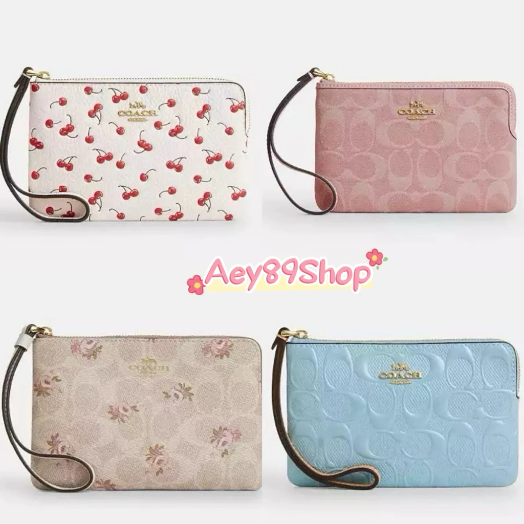 กระเป๋าคล้องมือ รุ่น Corner Zip Wristlet In Signature Canvas มีสีให้เลือก