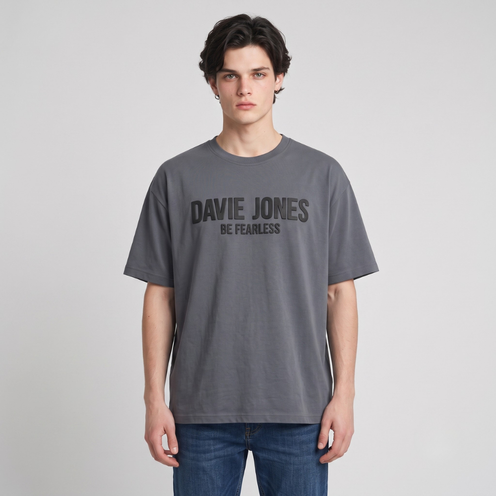 DAVIE JONES تيشيرت رجالي واسع بالشعار