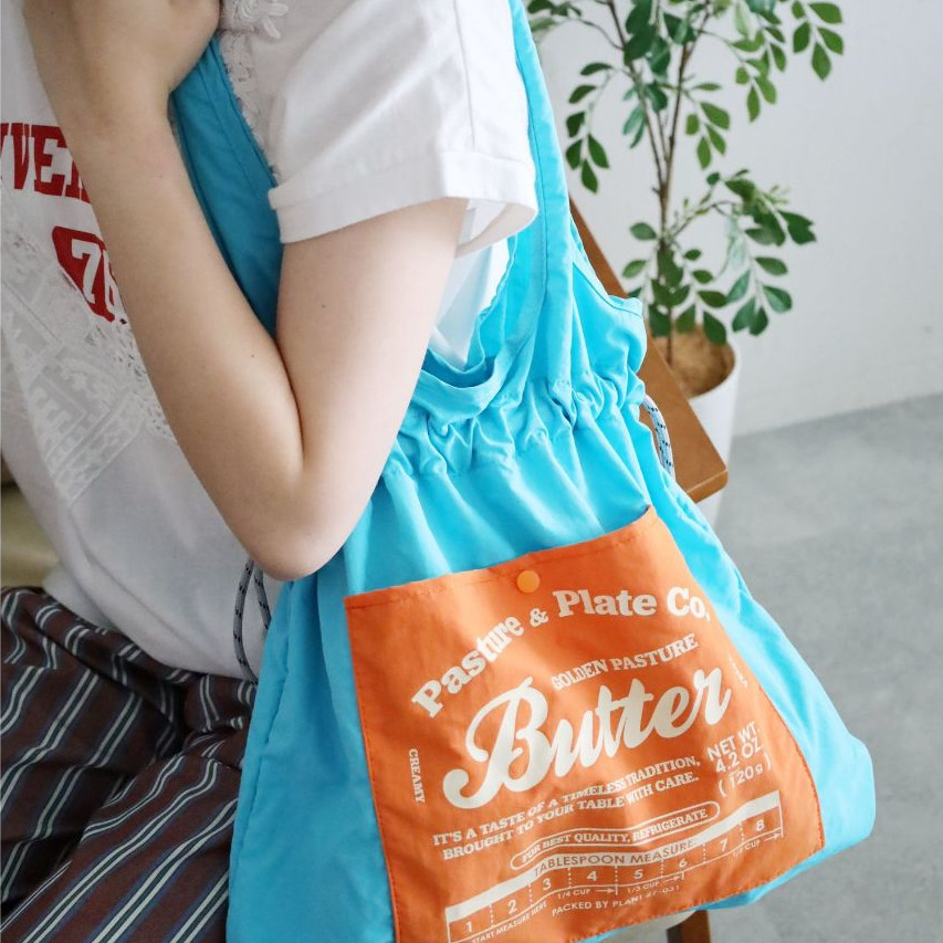 niko and ... กระเป๋าโท้ตทรงถุงเชือกรูด Pocket drawstring tote bag