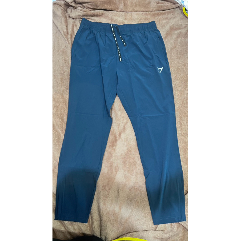 กางเกงขายาว ของแท้ มือ 1 Gymshark Arrival woven joggers