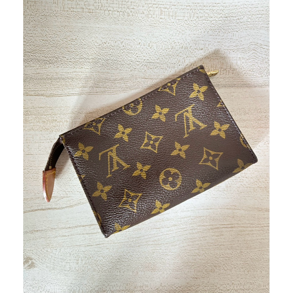 lv monogram toiletry pouch 15