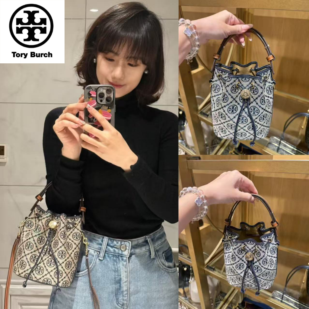 “ของแท้ 100%” TORY BURCH กระเป๋าทรงถังที่มีเชือกผูกและโลโก้รูปตัว T นี้สามารถสะพายไหล่หรือสะพายข้างได้