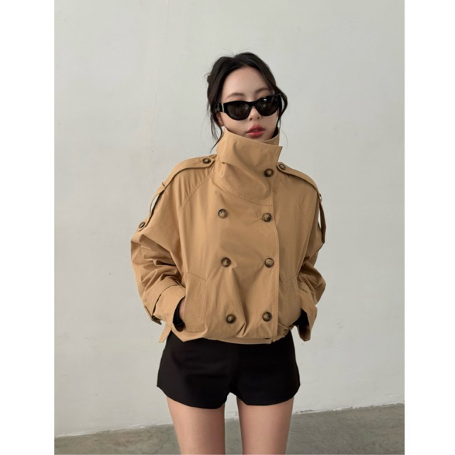 As hush trench coat - buttoned to the top