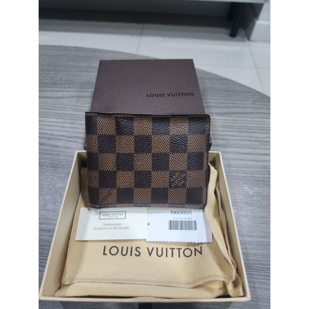 มือสองแท้ กระเป๋าสตางค์ LV Multiple Wallet ในลาย Damier Ebene