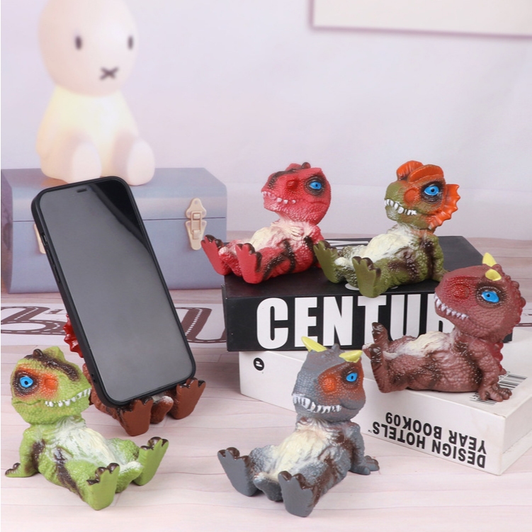 ที่วางมือถือไดโนเสาร์ T-Rex ท่าทางกวนๆ โมเดลไดโนเสาร์ 3D ตั้งโต๊ะน่ารัก ขาตั้งโทรศัพท์ทีเร็กซ์ ขยับแขนขาได้ เรซิน