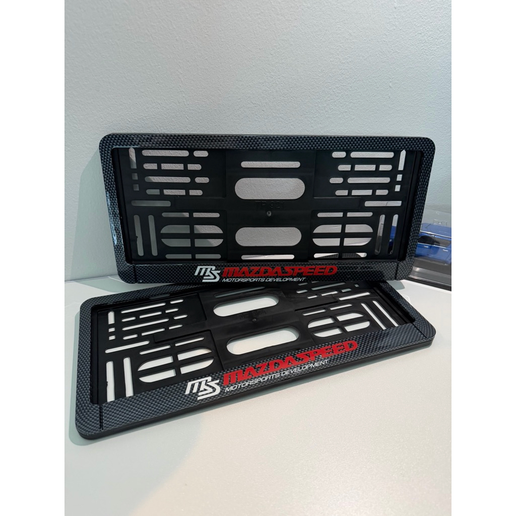 MAZDA กรอบป้ายทะเบียนรถยนต์พลาสติก ชุบเคฟล่า พร้อมสกรีน