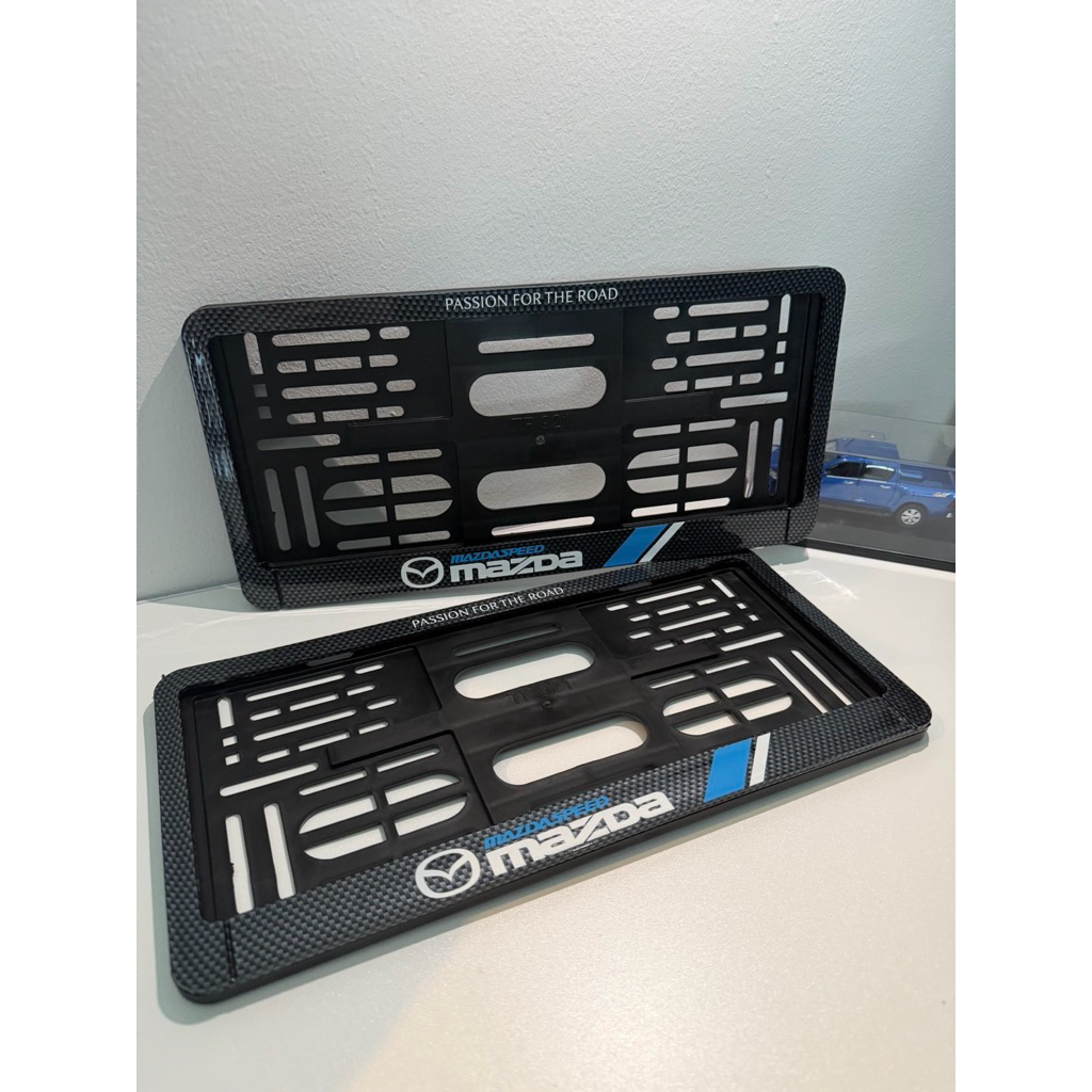 MAZDA กรอบป้ายทะเบียนรถยนต์พลาสติก ชุบเคฟล่า พร้อมสกรีน