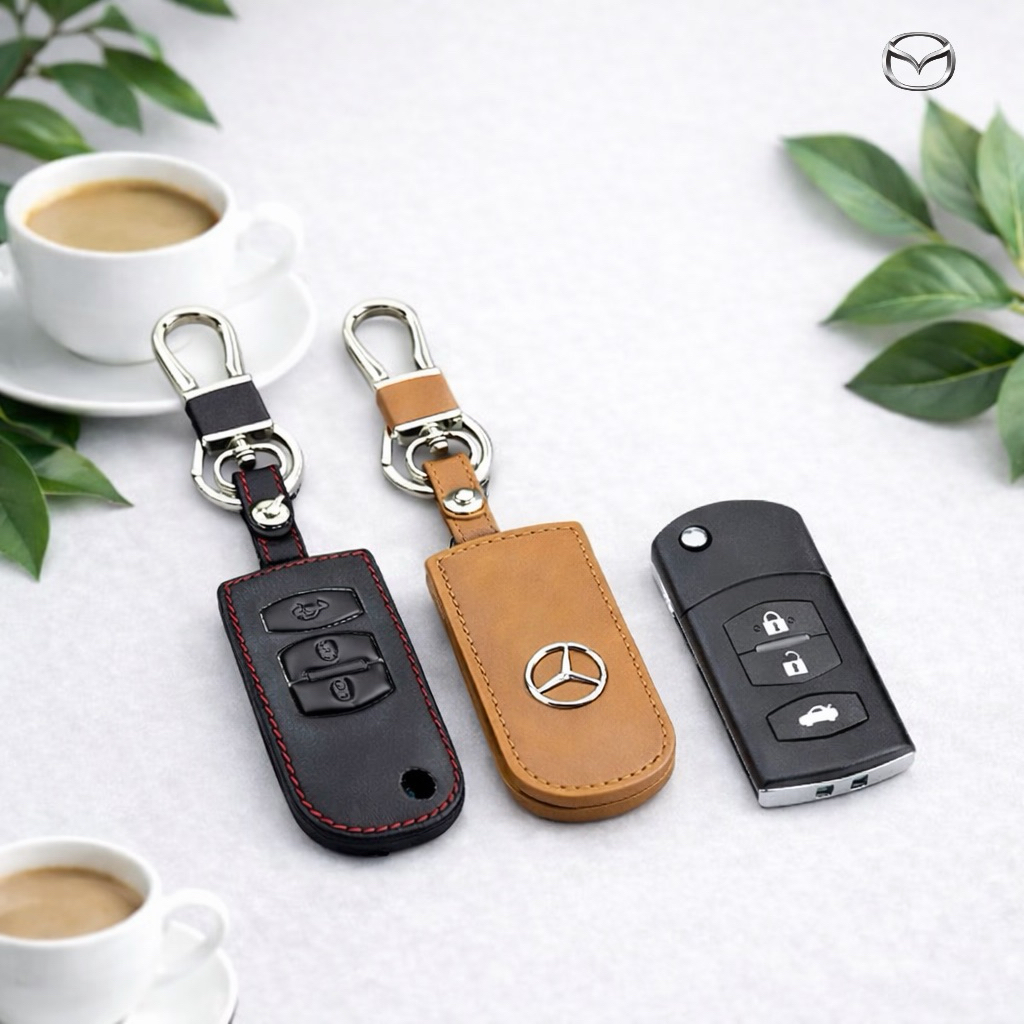 ซองหนังแท้ ใส่กุญแจรีโมทรถยนต์ รุ่นโลโก้เหล็ก Mazda 2,3 พับข้าง รุ่น 3 ปุ่ม