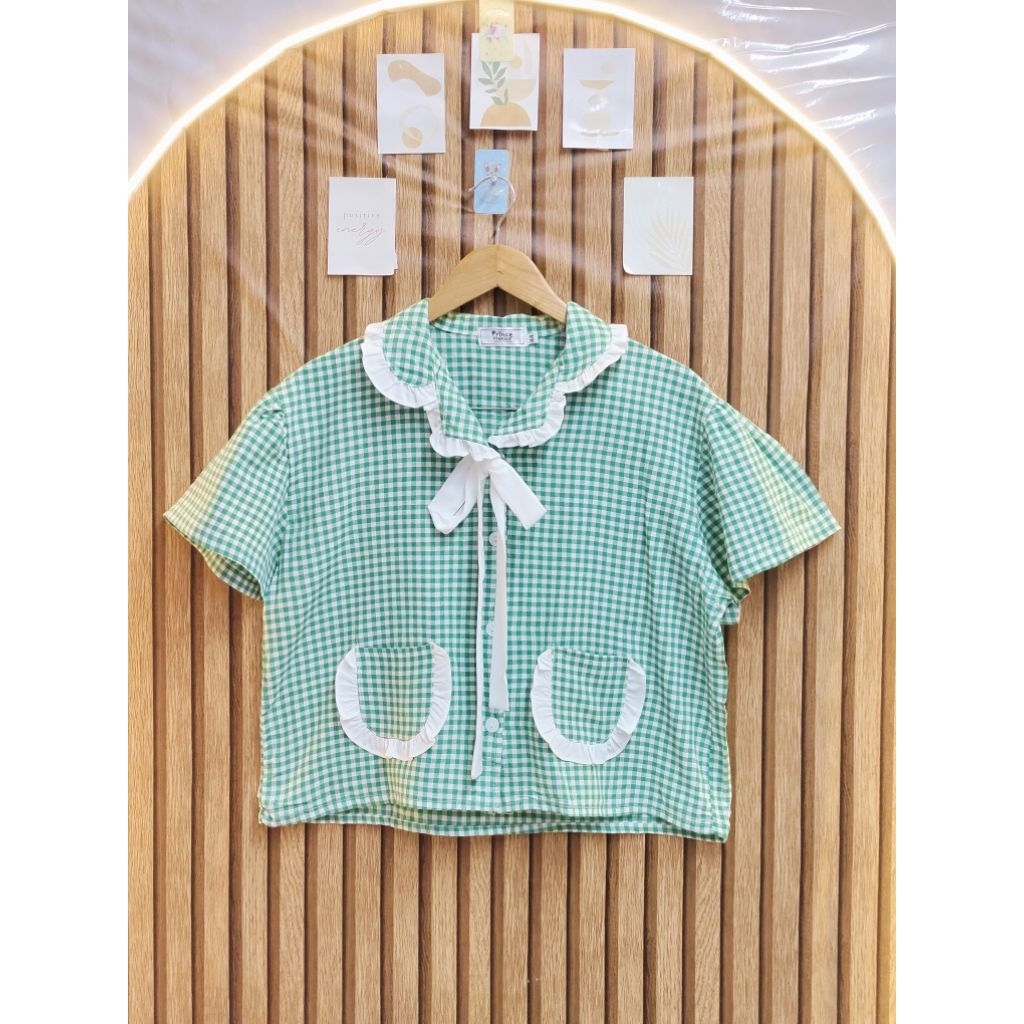 เสื้อลายสก๊อตป้าย Prince Premium สีเขียวแต่งมัดโบว์ด้านหน้า