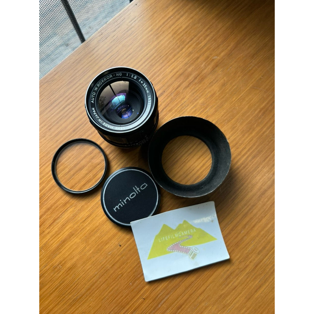 เลนส์มือหมุน Minolta  Auto W Rokkor-HG 35mm f2.8 พร้อมฝาหน้าหลังแท้