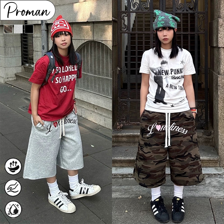 PROMAN กางเกงขาสามส่วนลายพราง ยูนิเซ็กส์ สไตล์อเมริกันวินเทจ ปักหัวใจสุดเท่ สายเชือกรูดเอว ทรงหลวมขากว้าง ใส่ได้ทุกโอกาส