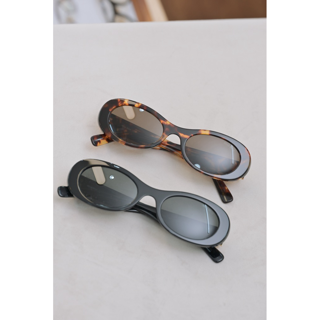 แว่นกันแดด Miu Miu MU06ZS