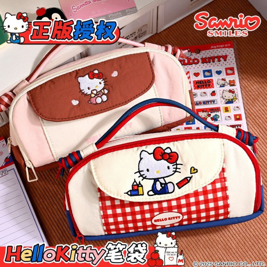 กระเป๋าใส่ดินสอ Hello Kitty สินค้าลิขสิทธิ์แท้💯💯💯 วัสดุเป้นเนื้อผ้าร่ม มีหูหิ้ว ลายคิตตี้เป็นงานปัก มี 2 สี ใบละ 279 บาท
