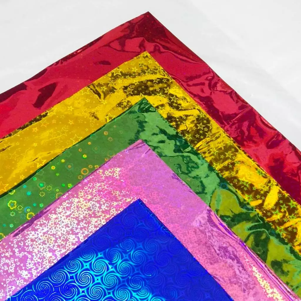 กระดาษเลเซอร์-ฟอยล์ห่อของขวัญ สีเดียว25แผ่น / คละสี 25แผ่น ขนาด 65x54cm (กระดาษเลเซอร์-กราฟฟิค)