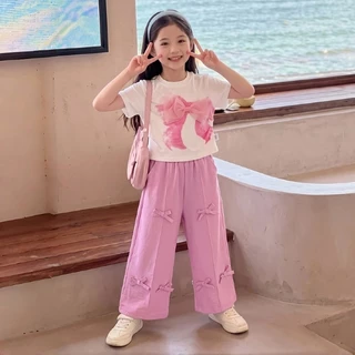 ชุดน่ารักสไตล์เกาหลีสำหรับเด็กผู้หญิง: เสื้อพิมพ์ลายโบว์ 3 มิติ + กางเกงพิมพ์ลายโบว์เข้าชุด ชุดลำลองที่ใส่ได้หลายโอกาส