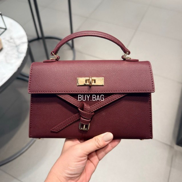 CHARLES & KEITH CK2-50701691 กระเป๋าถือดีเทลสายคาดแบบผูกปมรุ่น Tricha