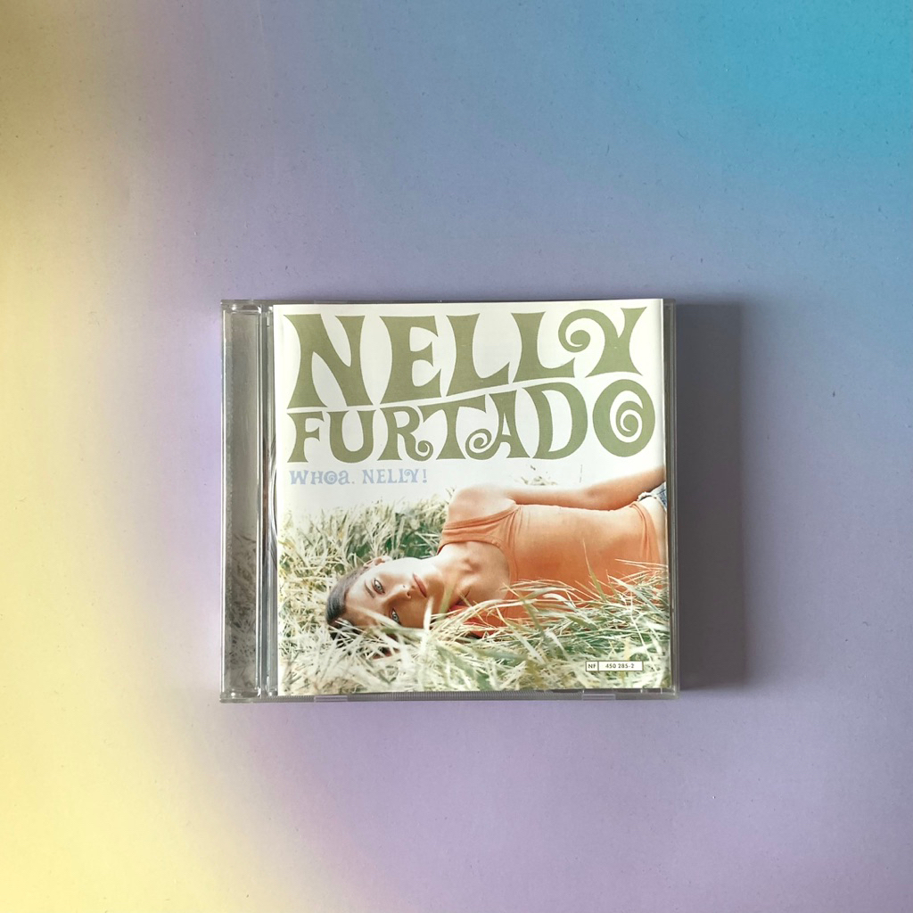 🛒 (พร้อมส่ง) CD ซีดีเพลง: Nelly Furtado — Whoa, Nelly! (Thailand Edition)
