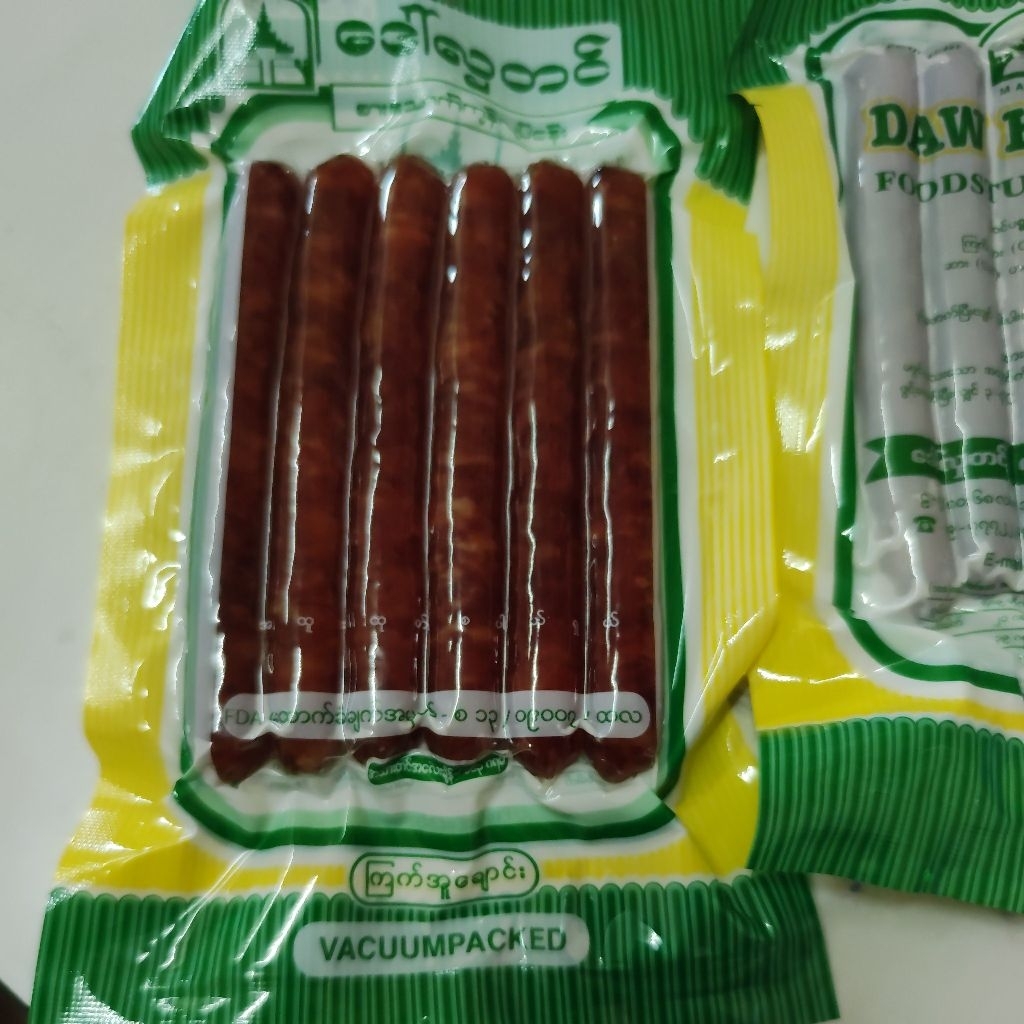 Daw Hla Tin foodstuff industry...