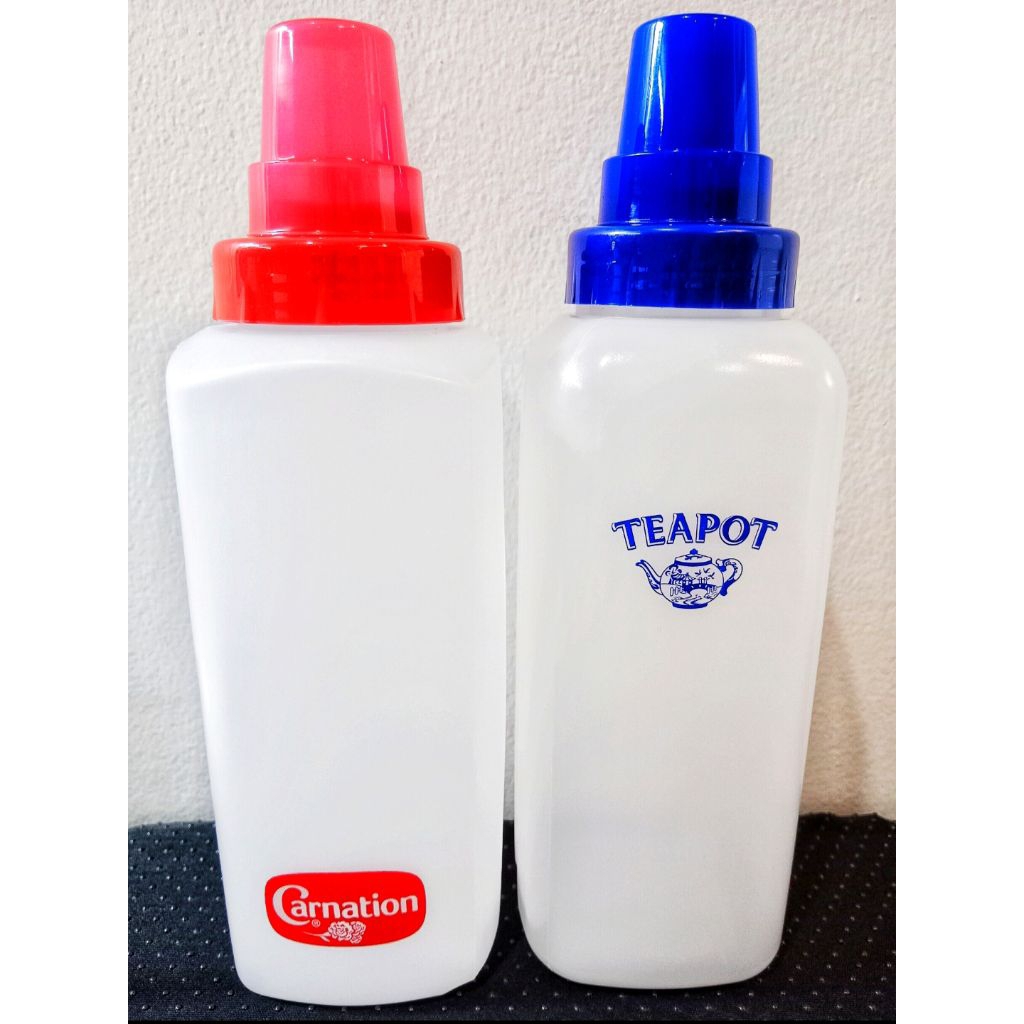 ขวดบีบคาร์เนชั่น/ทีพอท  ขนาด 1200 ml  ขวดบีบนม ขวดบีบซอส มีสเกล ขนาด กว้าง 9 cm สูง 27 cm พลาสติก Food Grade (ราคาต่อใบ)