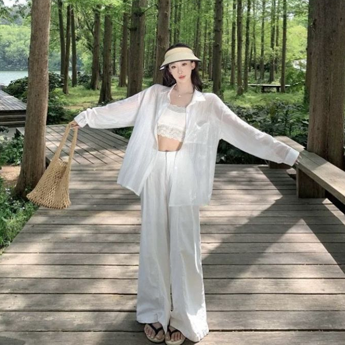 aililai1688 เสื้อเชิ้ต แขนยาว คอปก สีขาว ผ้าซีทรู แต่งโบว์ เรียบแต่ปัง ใส่แล้วดูสุภาพทันที พร้อมส่ง