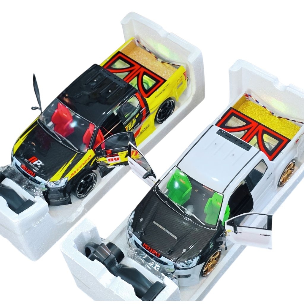 รถบังคับติดเครื่องเสียงออนิว d-max แต่งประตูเปิดปิดได้ คันใหญ่ ขนาด 1 / 10
